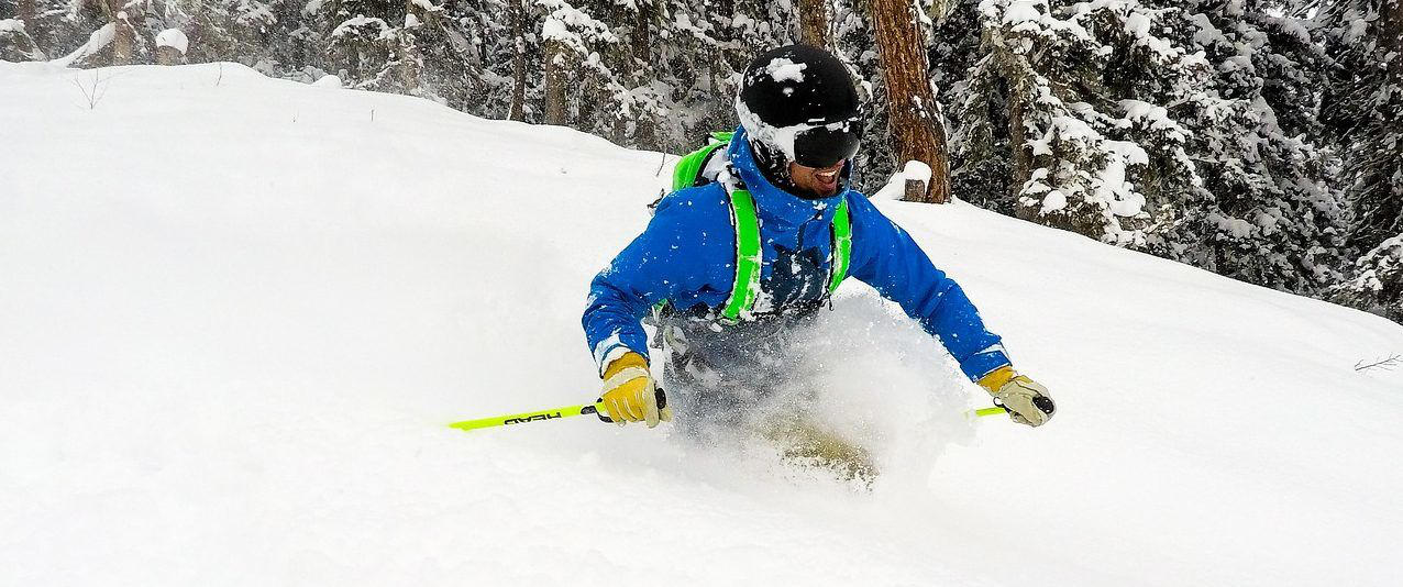 Skier on deep powder snow
